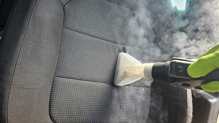Curățare profesională scaune auto textile cu abur și extracție în Oradea realizată de CleanSpot